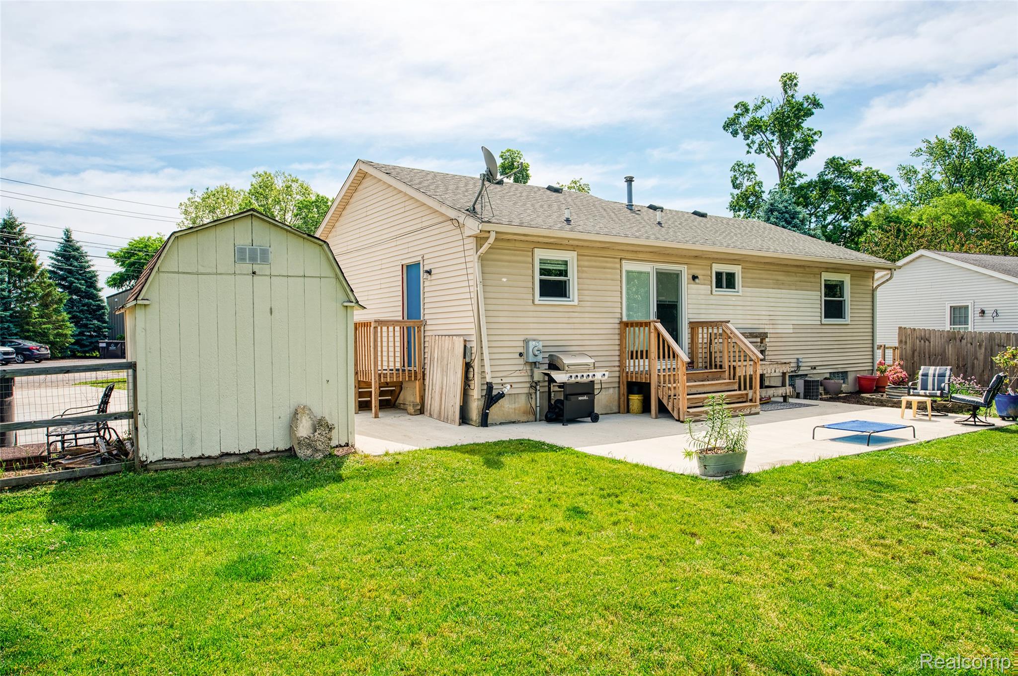 903 Jones Street Howell, MI 48843 - Photo 23 of 29 Back of House and Shed