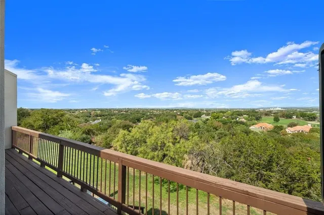 a view of a city from a balcony