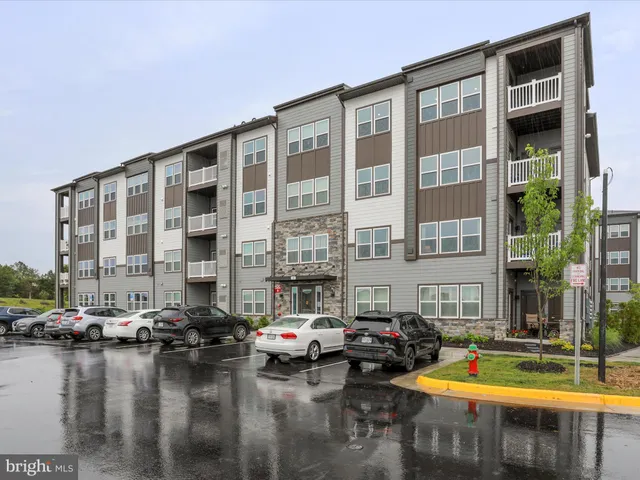 a view of pool with outdoor seating