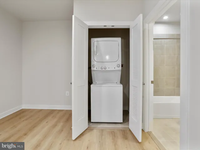 a view of a chair and table in the balcony