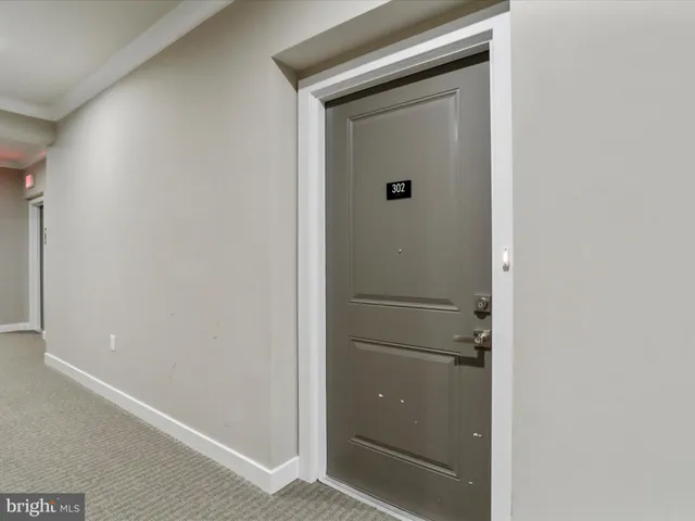 a bathroom with a glass door