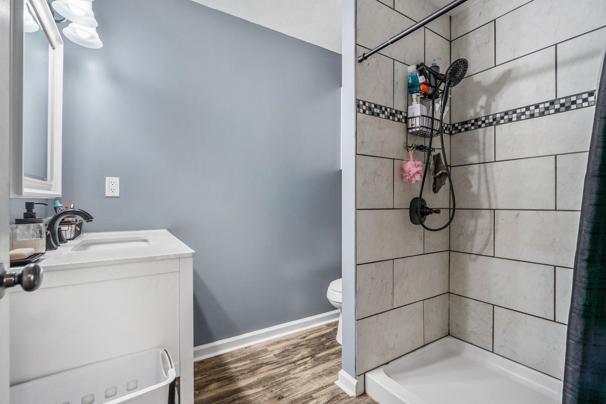425 South Young Street Sparta, TN 38583 - Photo 14 of 34 a bathroom with a sink and a shower