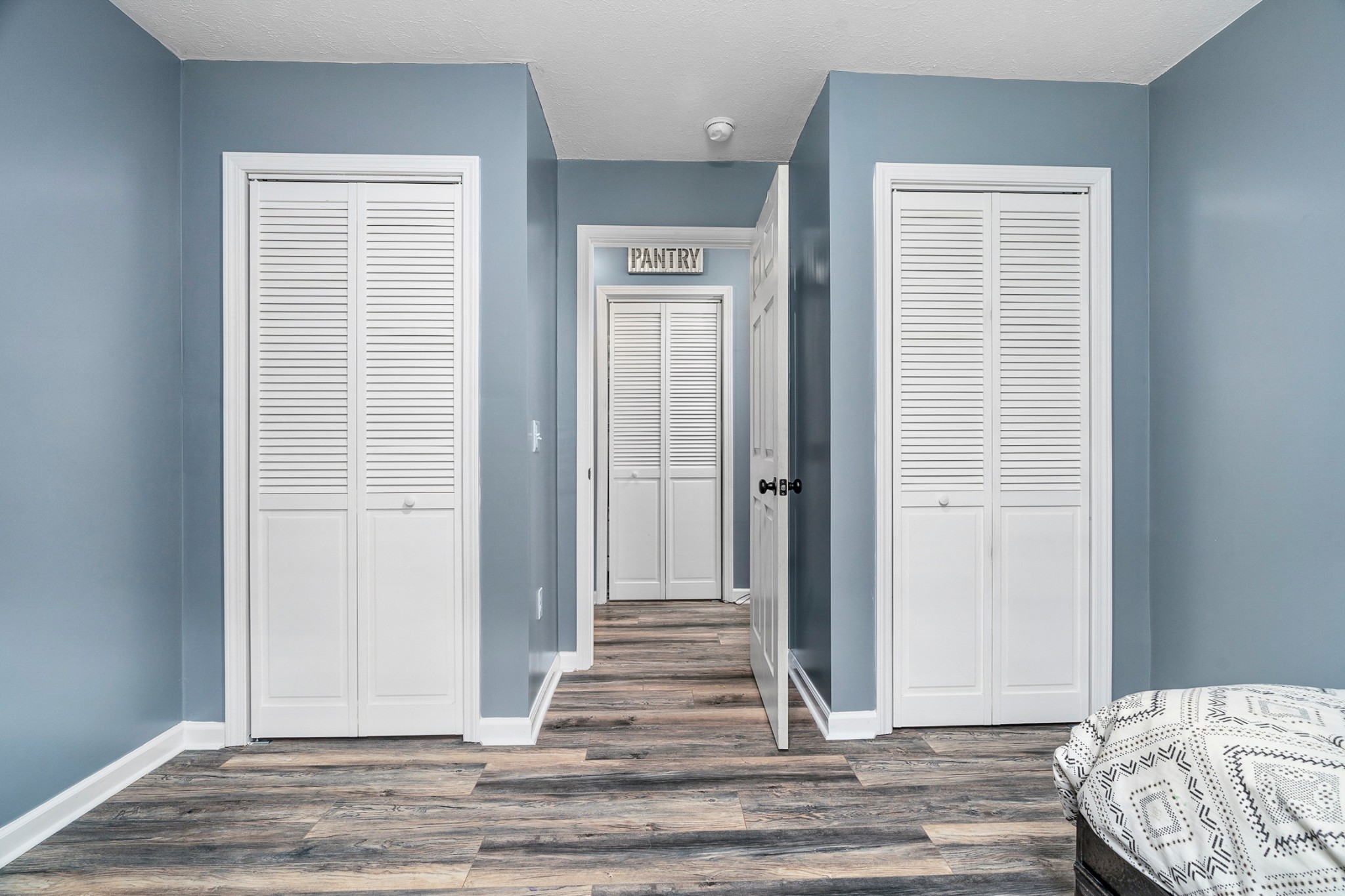425 South Young Street Sparta, TN 38583 - Photo 18 of 34 a view of a bedroom with wooden floor and closet