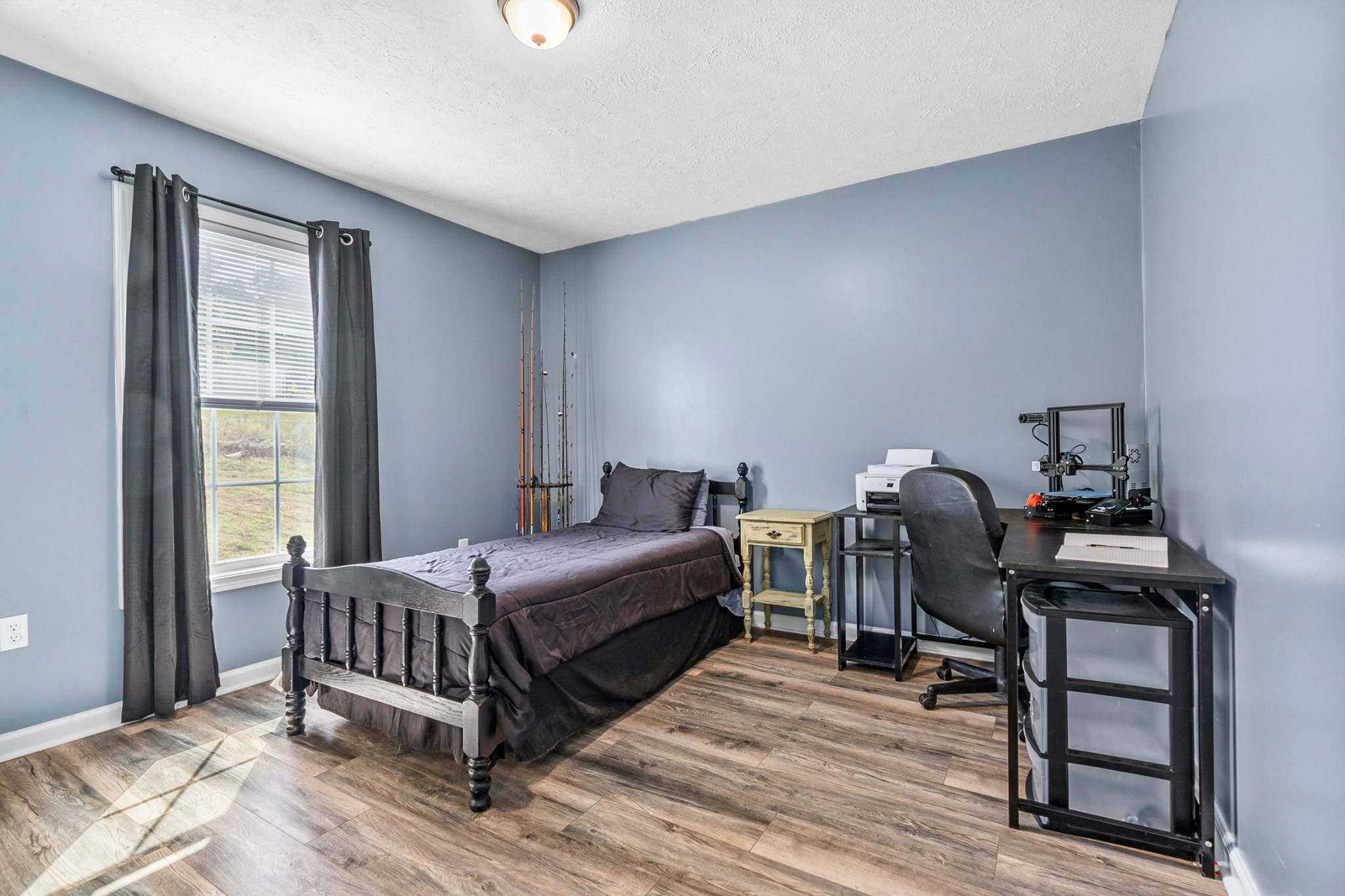 425 South Young Street Sparta, TN 38583 - Photo 19 of 34 a bedroom with a bed and a window