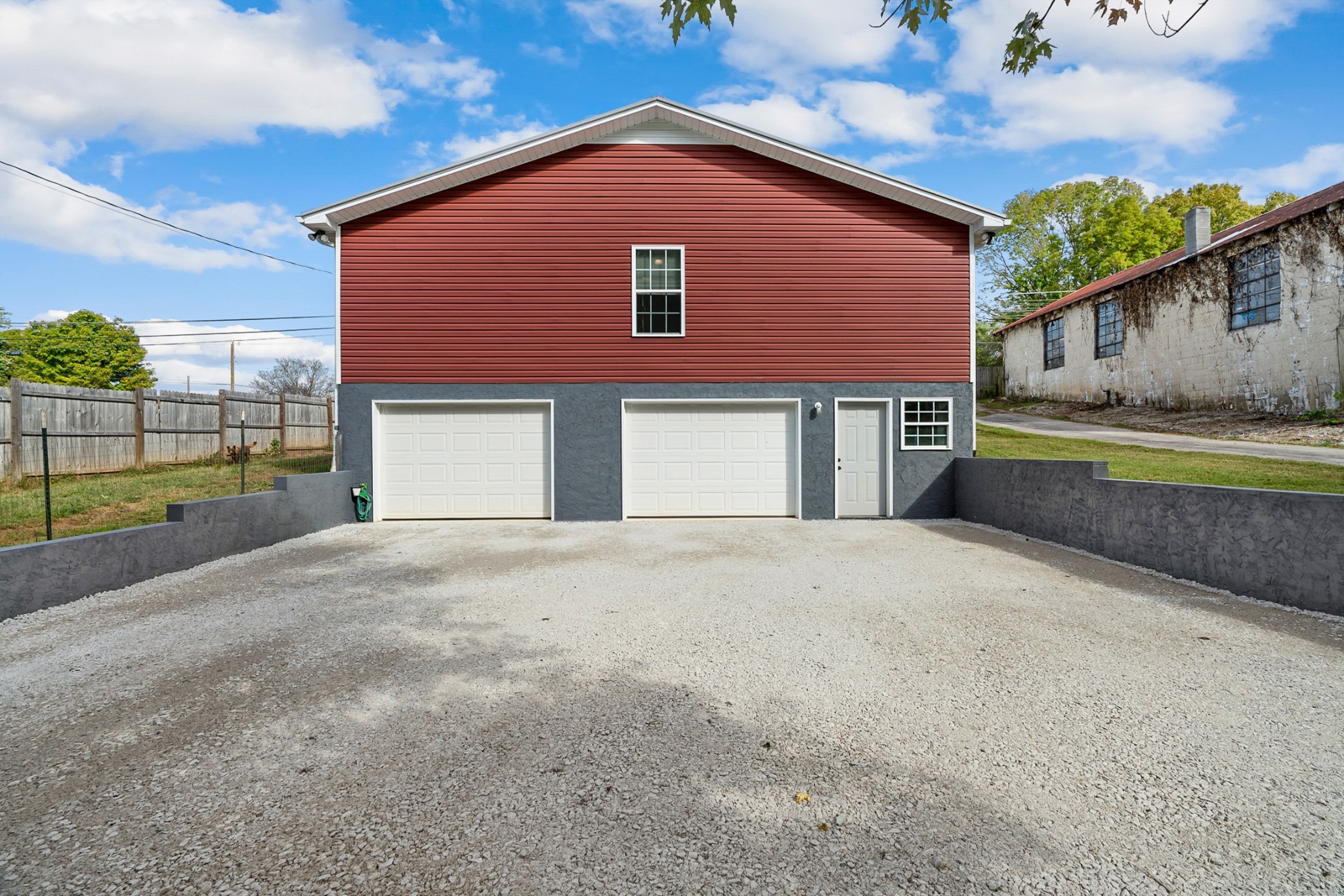 425 South Young Street Sparta, TN 38583 - Photo 25 of 34 a front view of a house with a yard and garage