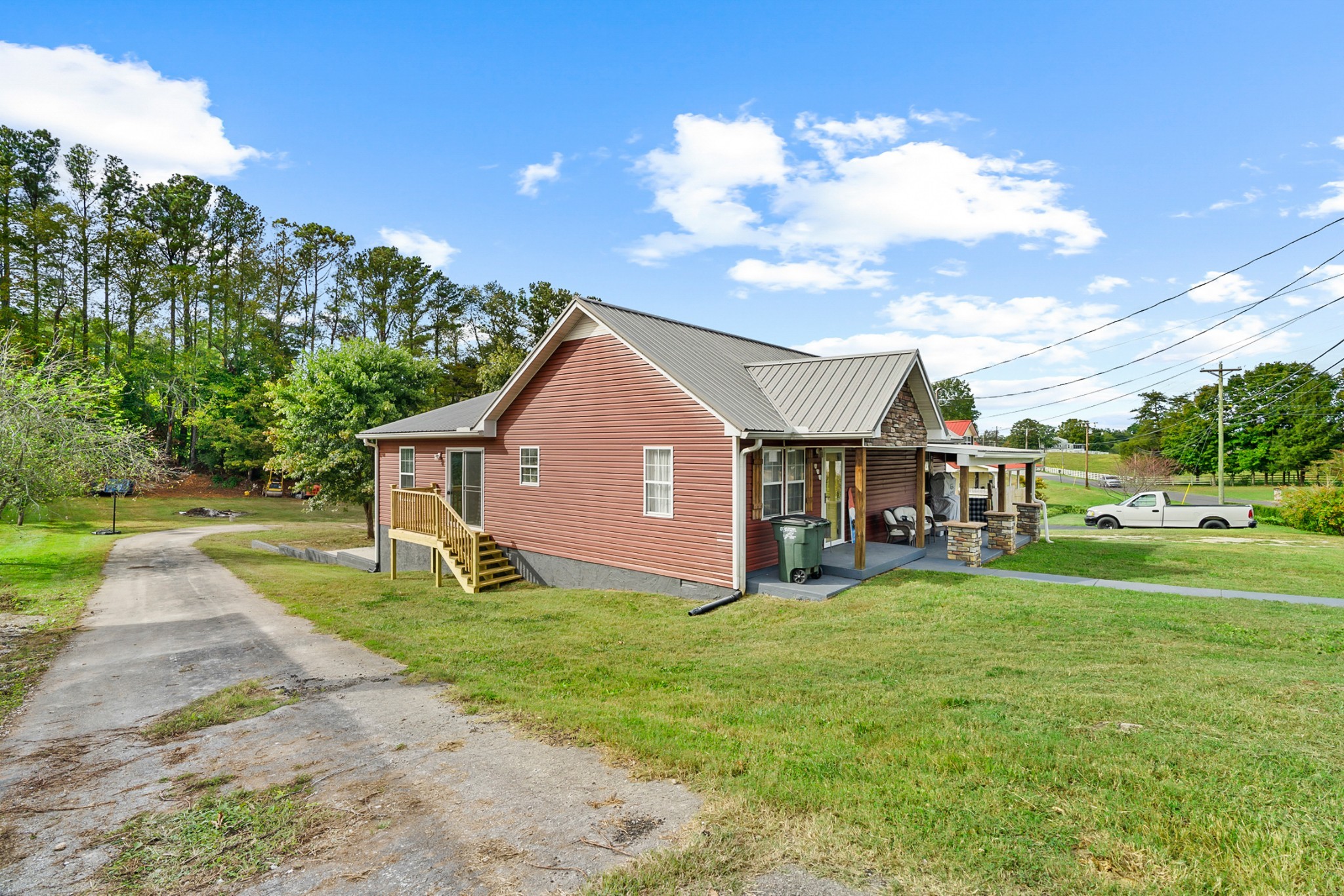 425 South Young Street Sparta, TN 38583 - Photo 26 of 34 a view of a house with a yard