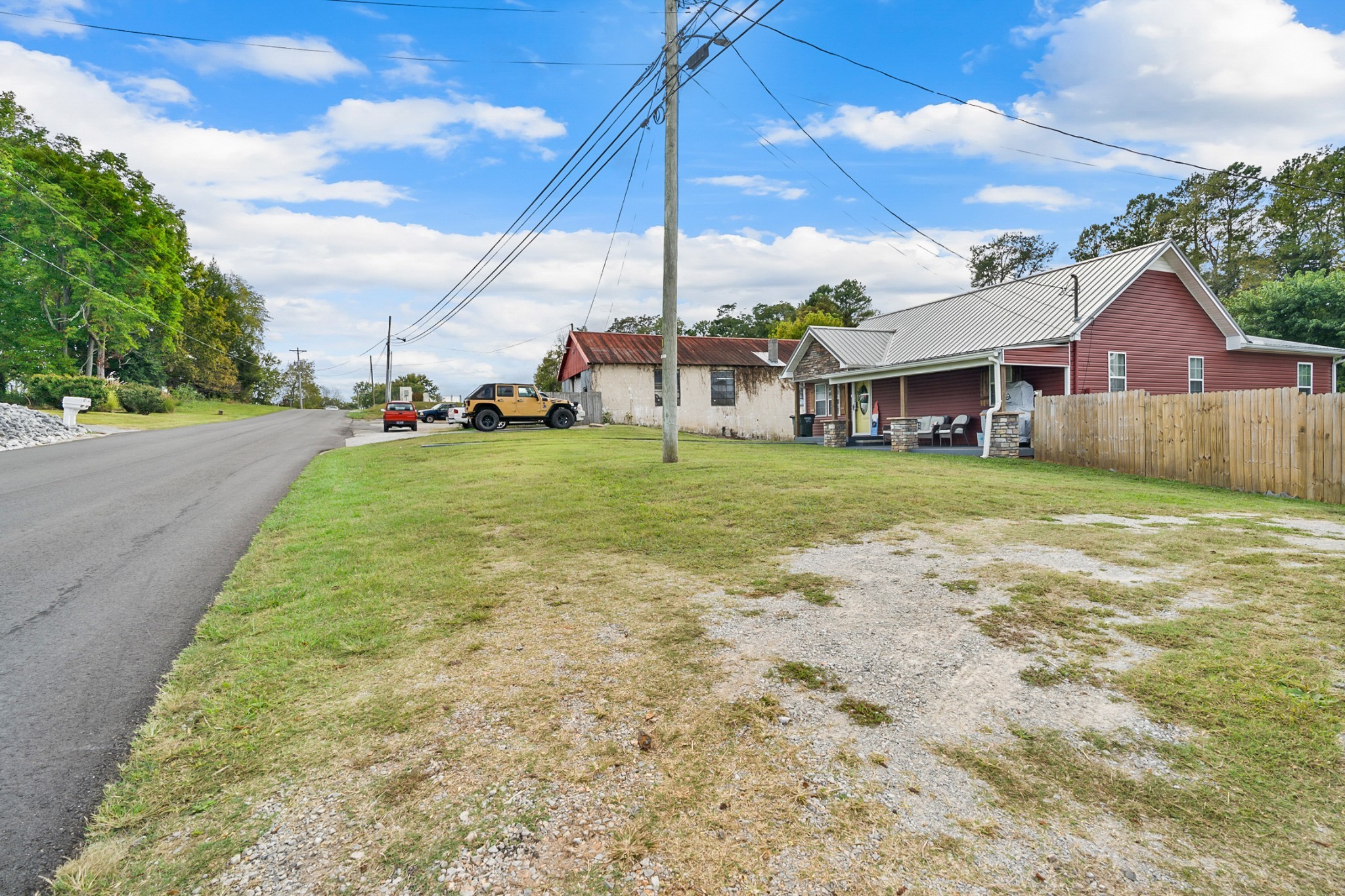 425 South Young Street Sparta, TN 38583 - Photo 32 of 34 a view of a house with a big yard and potted plants