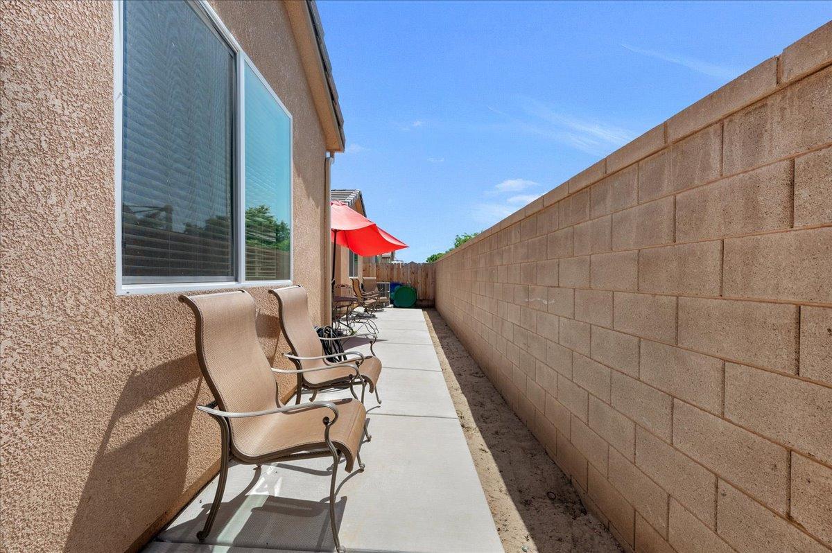 3012 Swift Lane Clovis, CA 93619 - Photo 29 of 40 a balcony with table and chairs