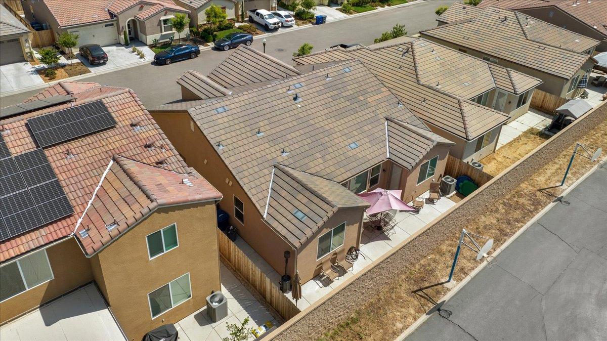 3012 Swift Lane Clovis, CA 93619 - Photo 34 of 40 an aerial view of a house with a yard