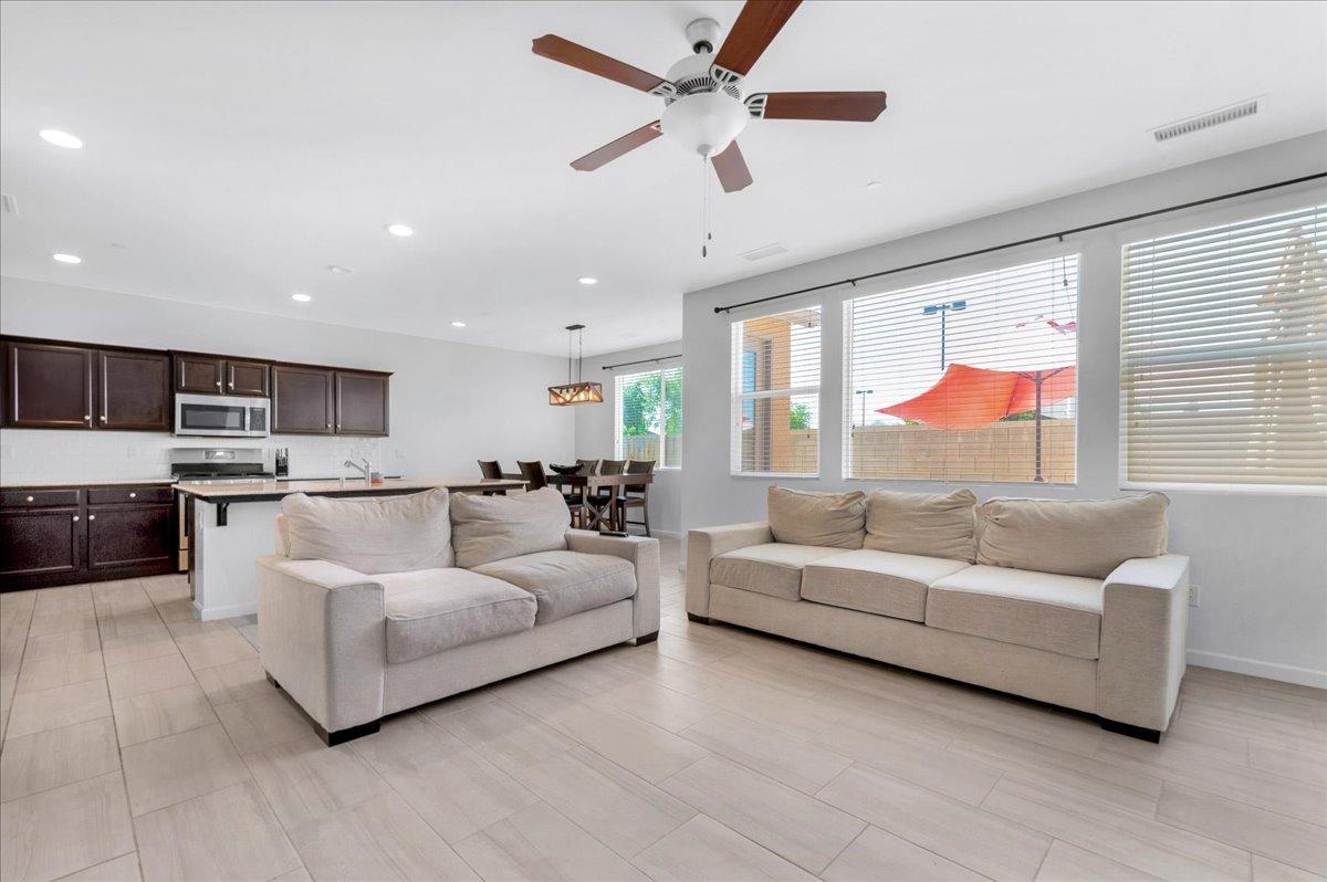 3012 Swift Lane Clovis, CA 93619 - Photo 4 of 40 a living room with furniture and a large window
