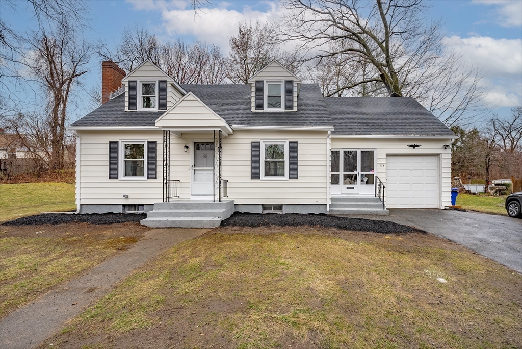 1174 Liberty Street Springfield, MA 01104 - Photo 34 of 34 a front view of a house with a yard