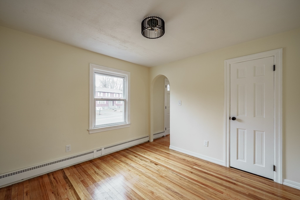 1174 Liberty Street Springfield, MA 01104 - Photo 8 of 34 a view of an empty room with window and closet area