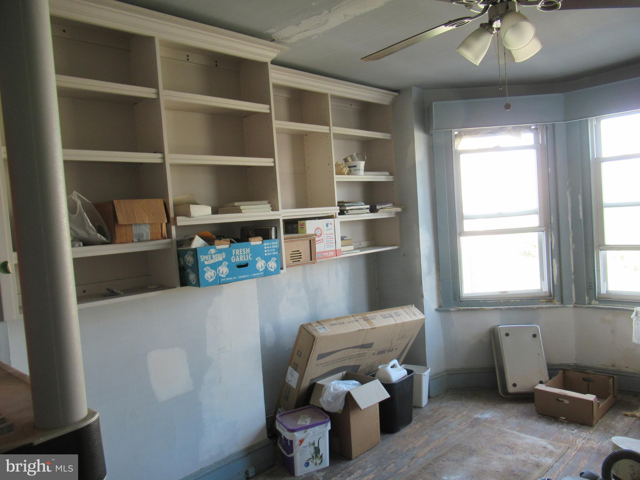 4953 Hawthorne Street Philadelphia, PA 19124 - Photo 7 of 9 a room with furniture and a window