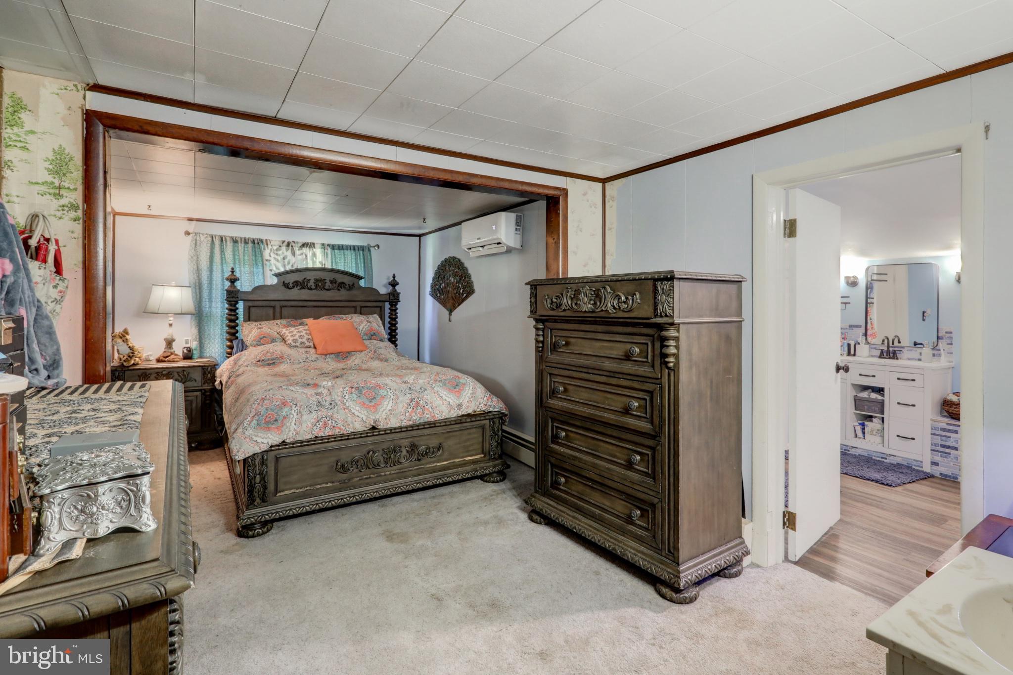 3472 Messersmith Road York, PA 17408 - Photo 26 of 41 Charming bedroom with vintage elegance.