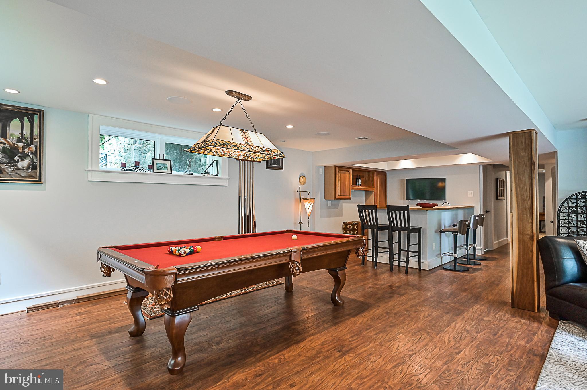 10600 Hunters Valley Road Vienna, VA 22181 - Photo 39 of 50 Lower Level Billards and Wet Bar