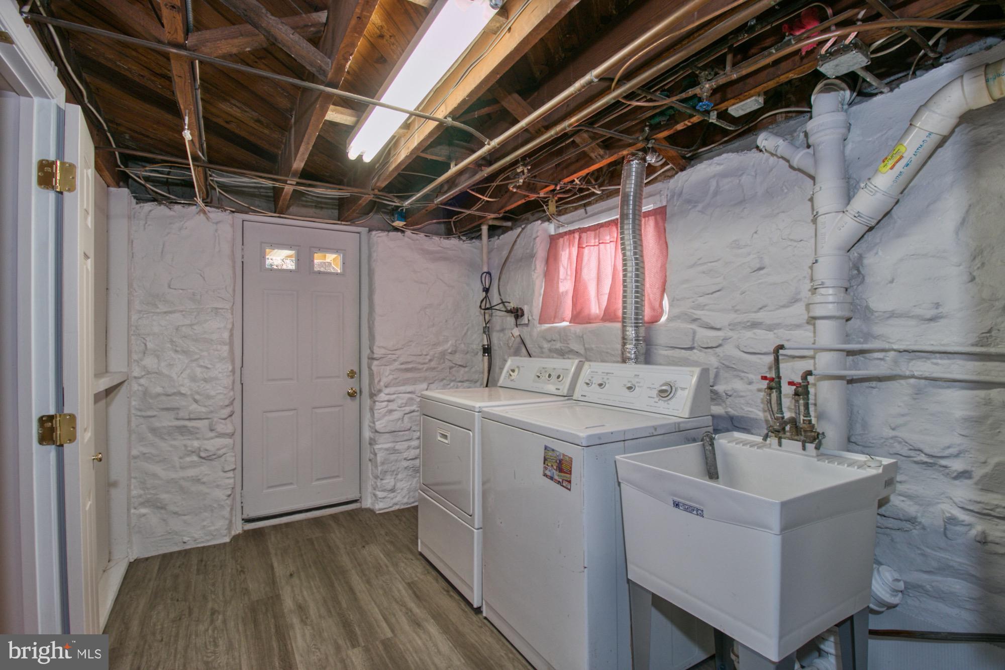 901 Greenleigh Road Baltimore, MD 21212 - Photo 38 of 81 Wood look floor in laundry room