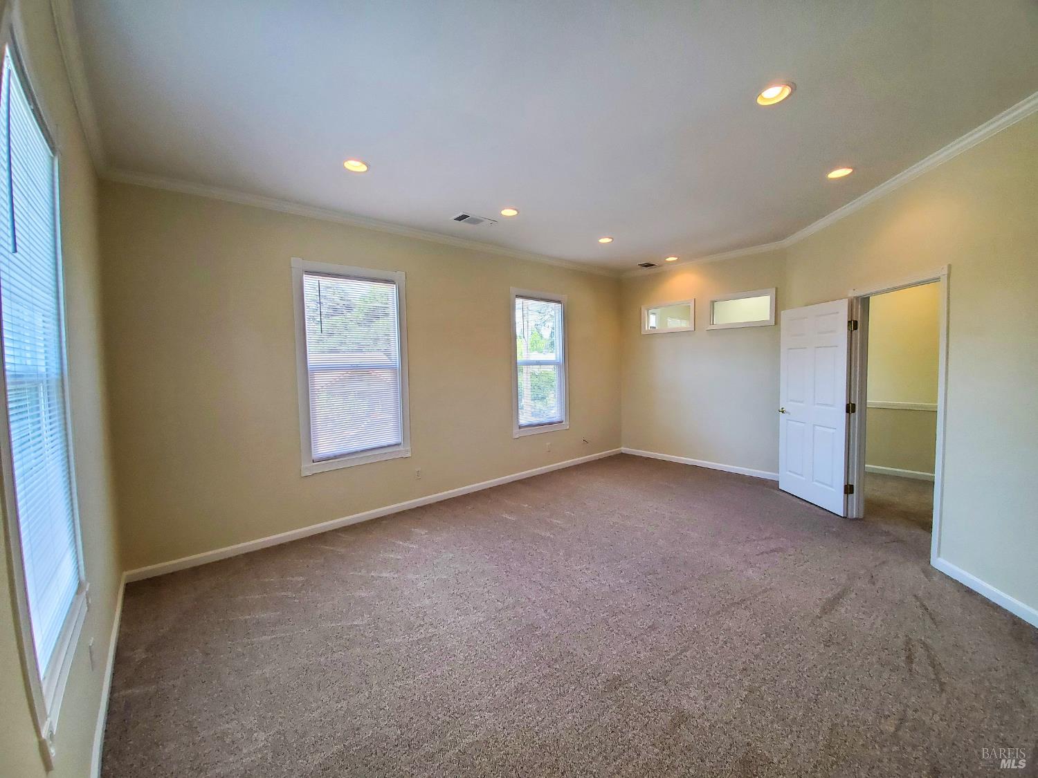 448 Sebastopol Avenue Santa Rosa, CA 95401 - Photo 14 of 21 an empty room with windows and closet
