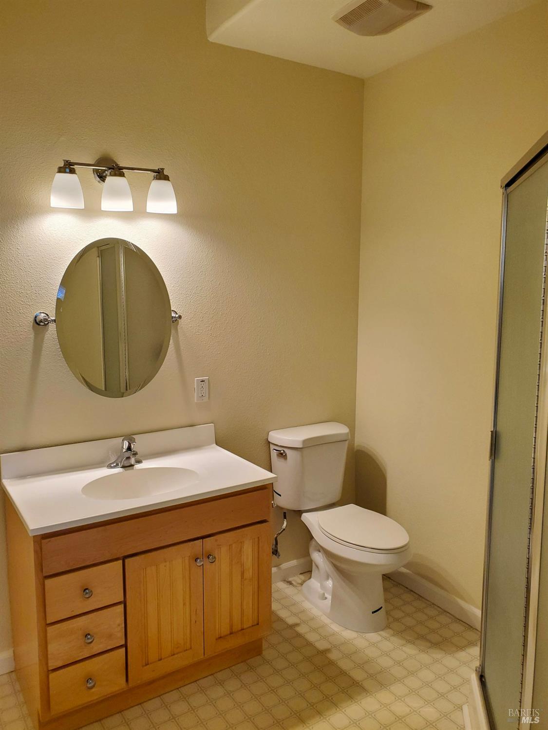 448 Sebastopol Avenue Santa Rosa, CA 95401 - Photo 17 of 21 a bathroom with a sink and a mirror