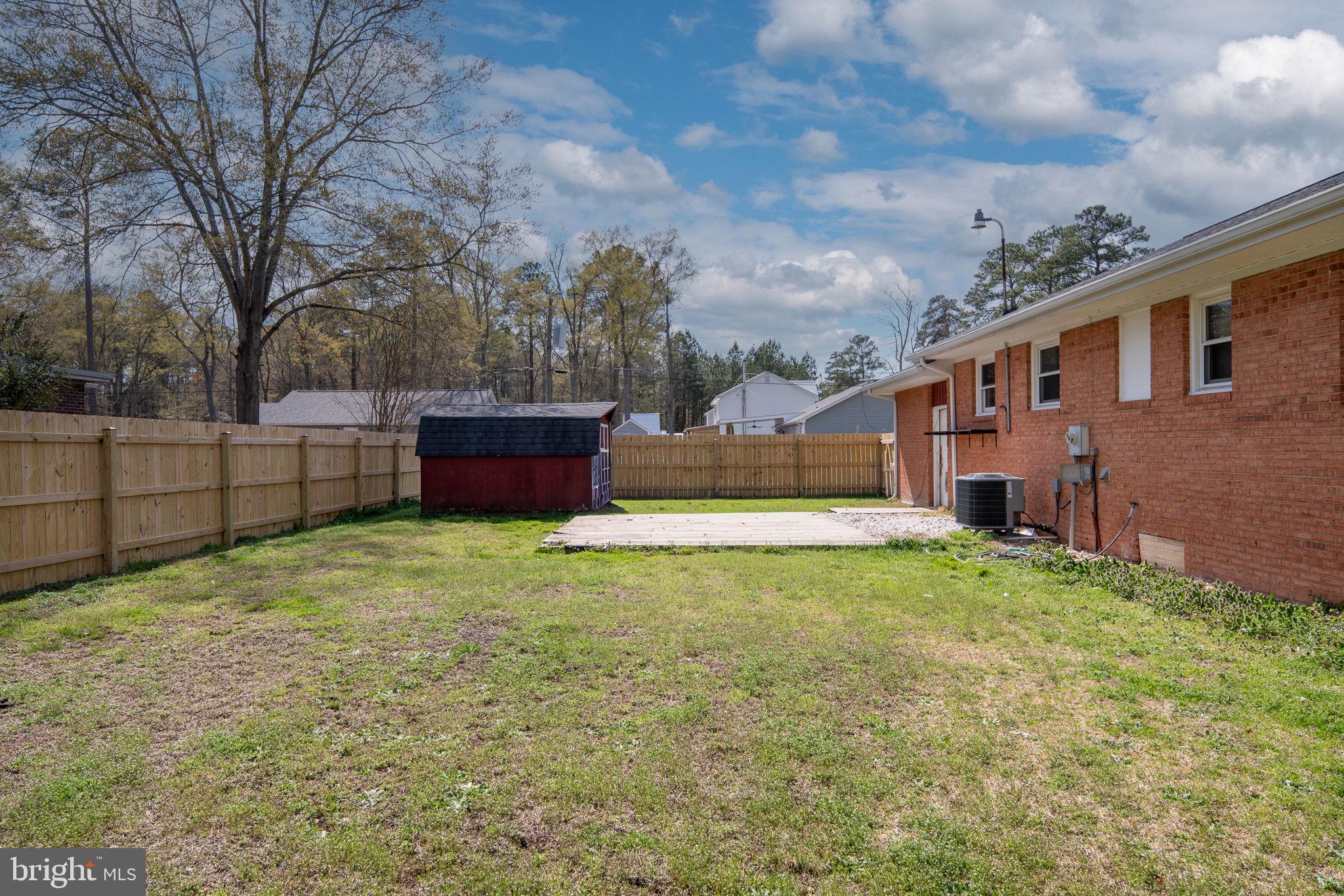 160 12th Street Colonial Beach, VA 22443 - Photo 36 of 60 front view of a house with a yard