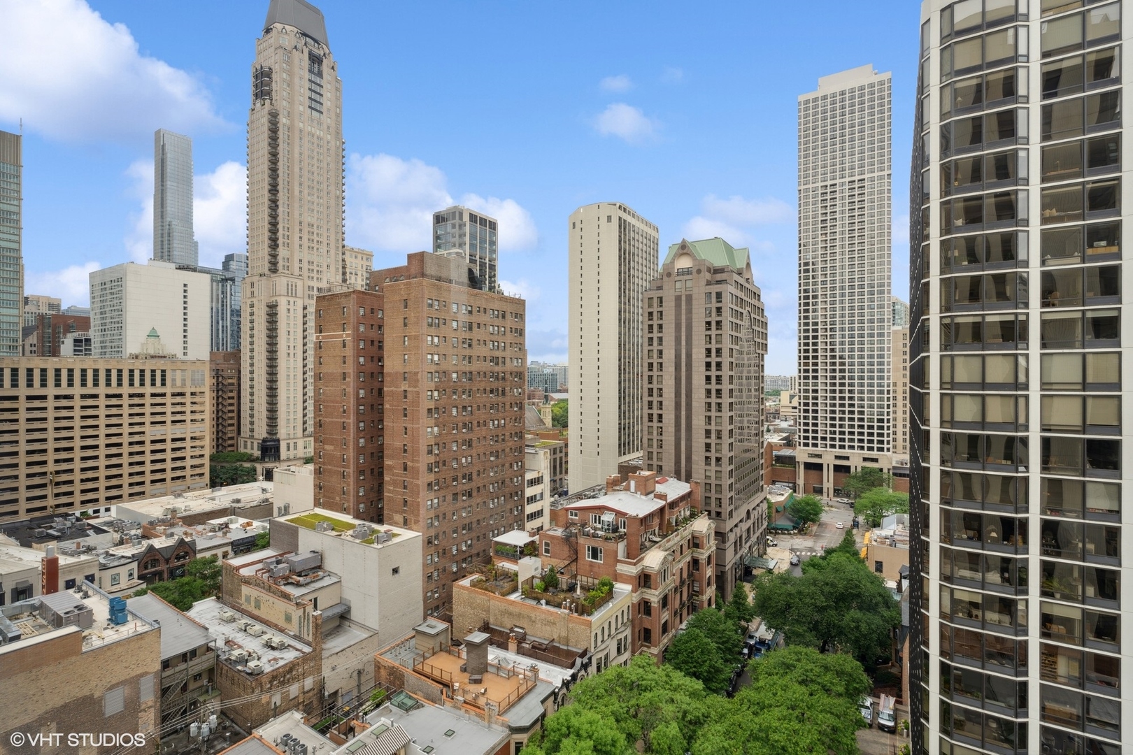100 East Bellevue Place, Unit 18D Chicago, IL 60611 - Photo 18 of 24 a view of city with tall buildings