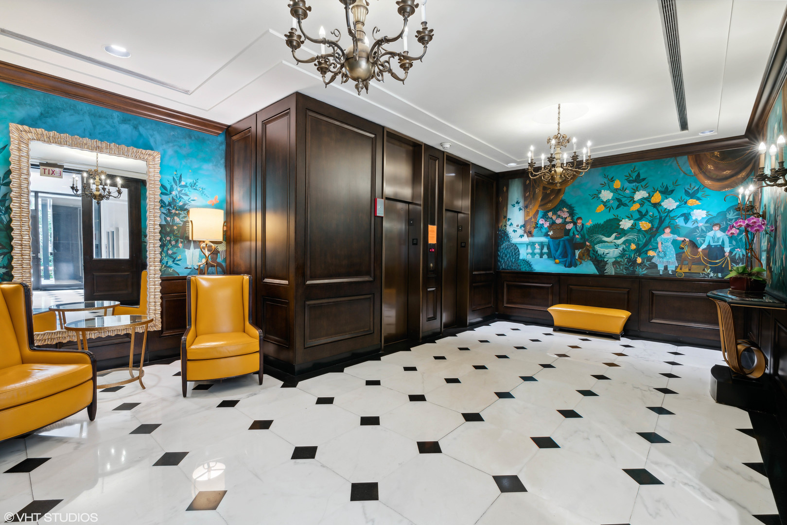 100 East Bellevue Place, Unit 18D Chicago, IL 60611 - Photo 23 of 24 a kitchen with stainless steel appliances kitchen island granite countertop a refrigerator and a fireplace