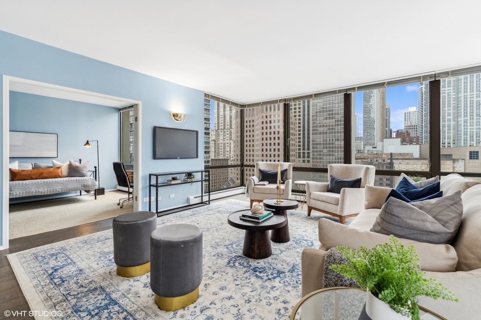 100 East Bellevue Place, Unit 18D Chicago, IL 60611 - Photo 4 of 24 a living room with furniture and a flat screen tv