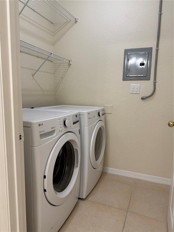 3725 Conroy Road, Unit 2127 Orlando, FL 32839 - Photo 13 of 30 a utility room with dryer and washer