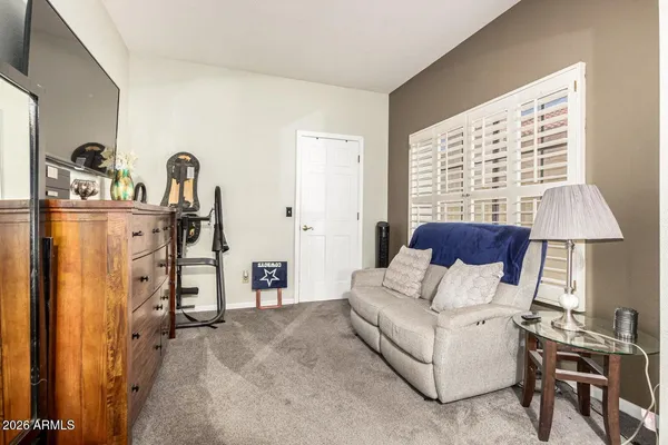 a living room with furniture and a window