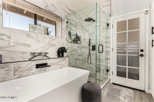 a bathroom with a sink and a shower