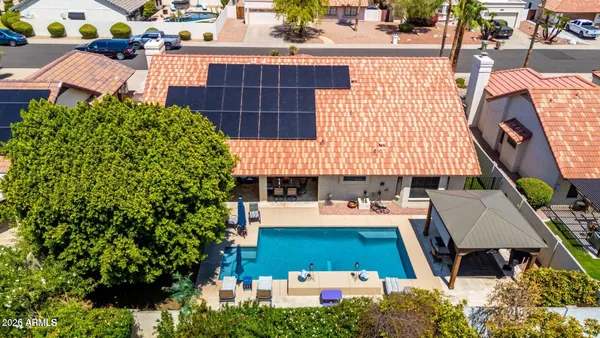 an aerial view of a house with a garden