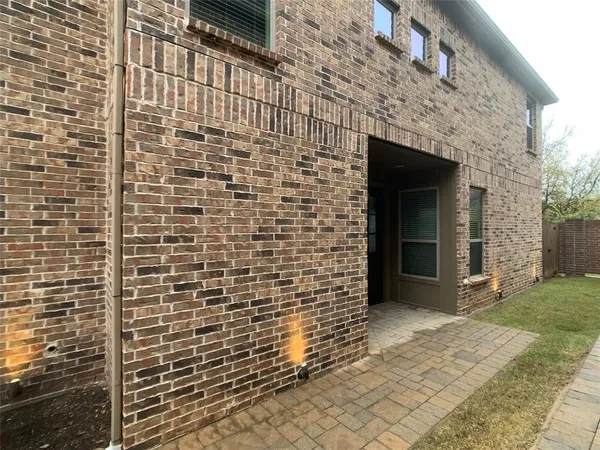 a view of a brick house with a sink