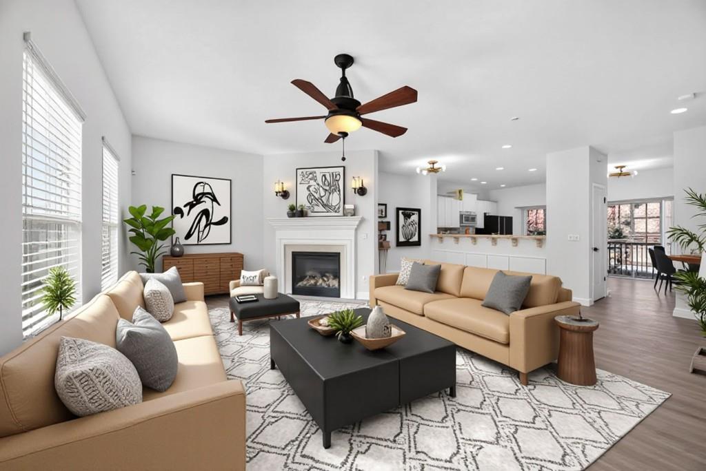 1646 Austin Meadows Drive Decatur, GA 30032 - Photo 15 of 29 a living room with furniture fireplace and a large window