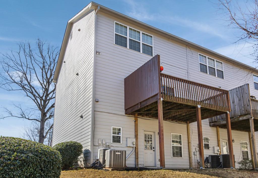 1646 Austin Meadows Drive Decatur, GA 30032 - Photo 28 of 29 a view of a house with a balcony