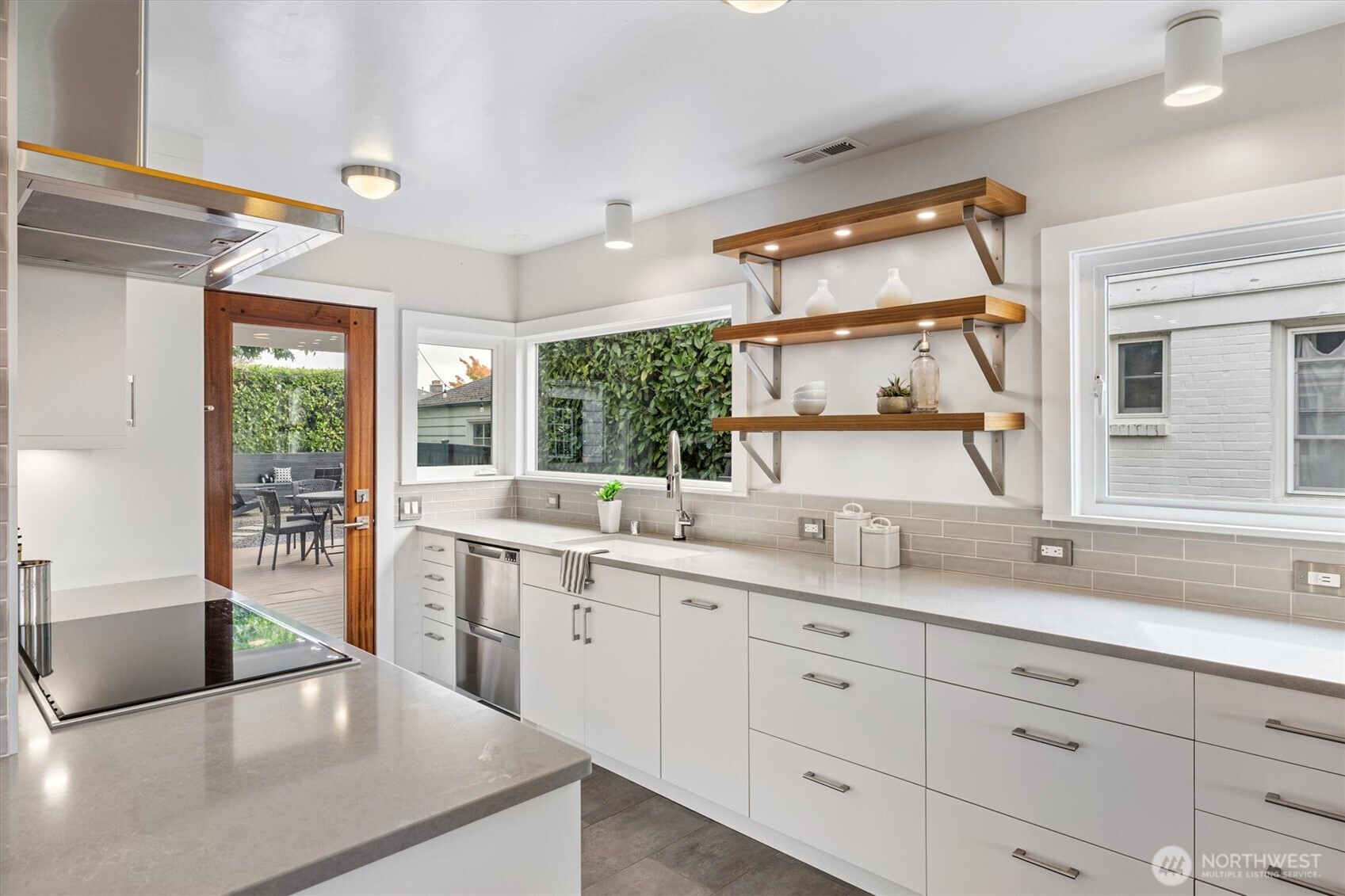 1940 Edgemont Place West Seattle, WA 98199 - Photo 12 of 37 a large white kitchen with a large window