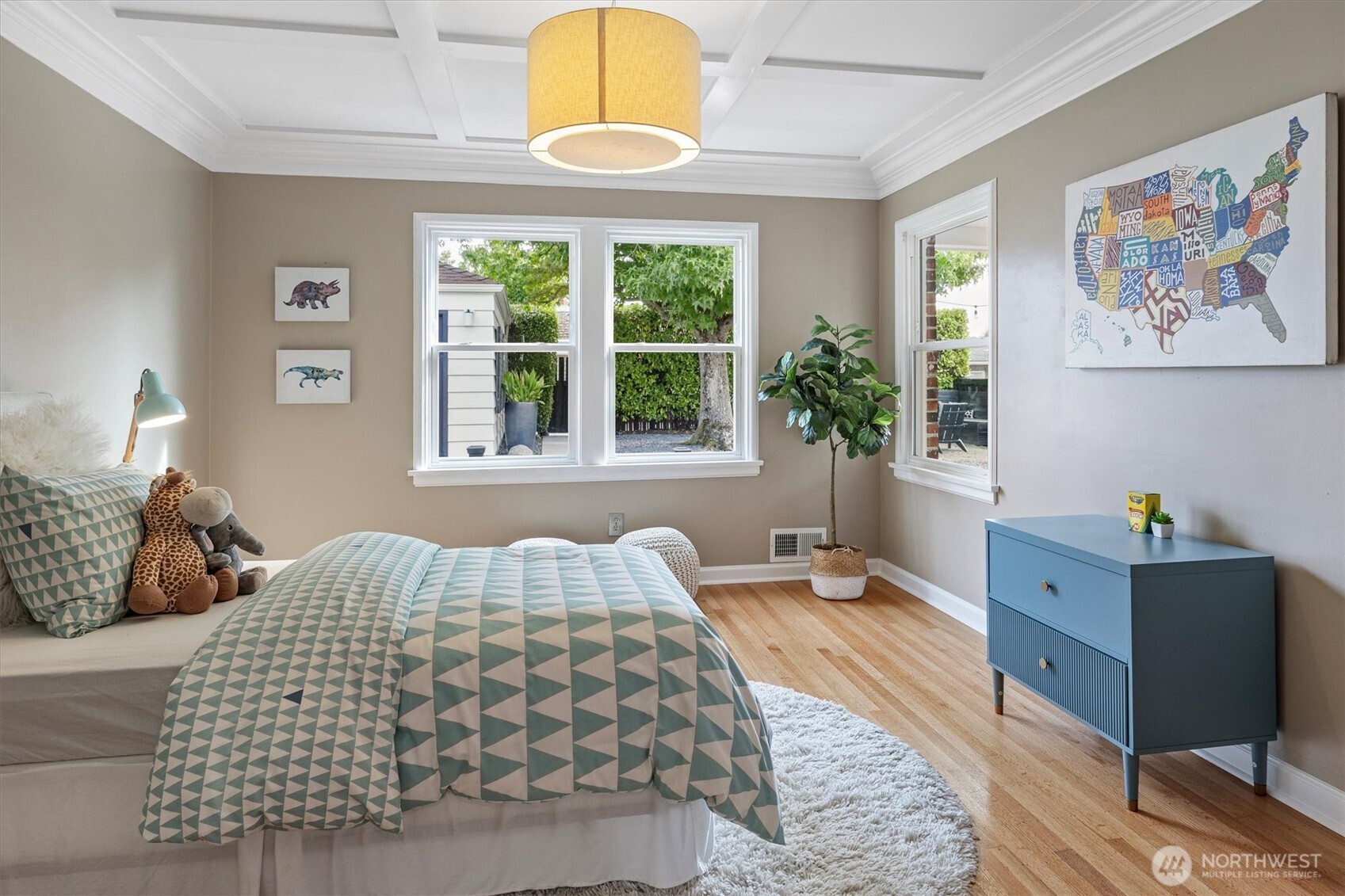 1940 Edgemont Place West Seattle, WA 98199 - Photo 17 of 37 a bedroom with a large bed and a window