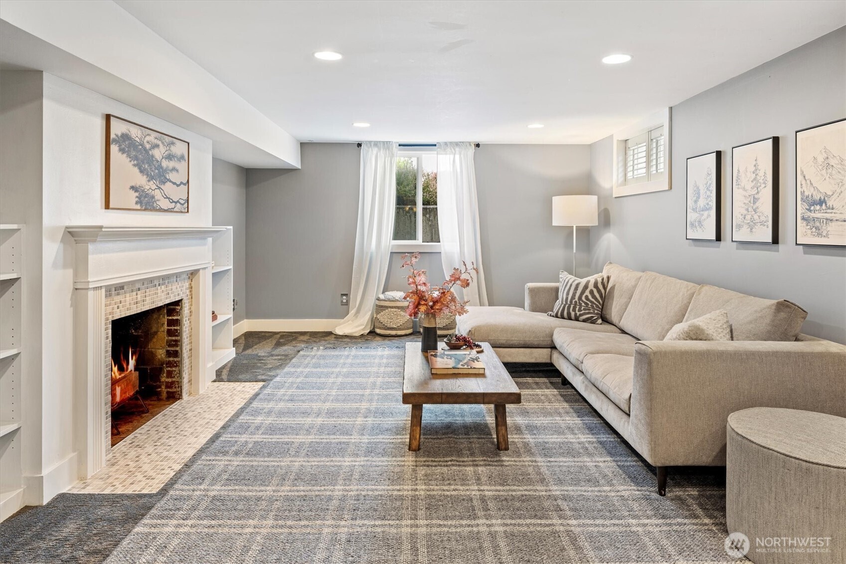 1940 Edgemont Place West Seattle, WA 98199 - Photo 20 of 37 a living room with furniture and a fireplace