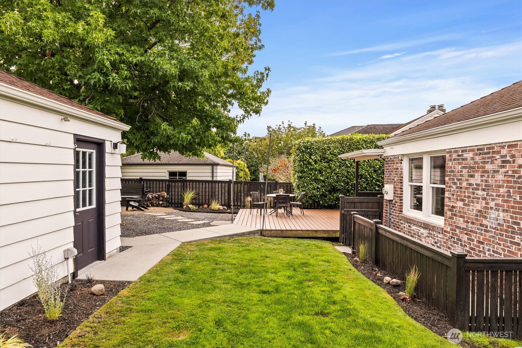 1940 Edgemont Place West Seattle, WA 98199 - Photo 30 of 37 a view of a backyard with sitting area