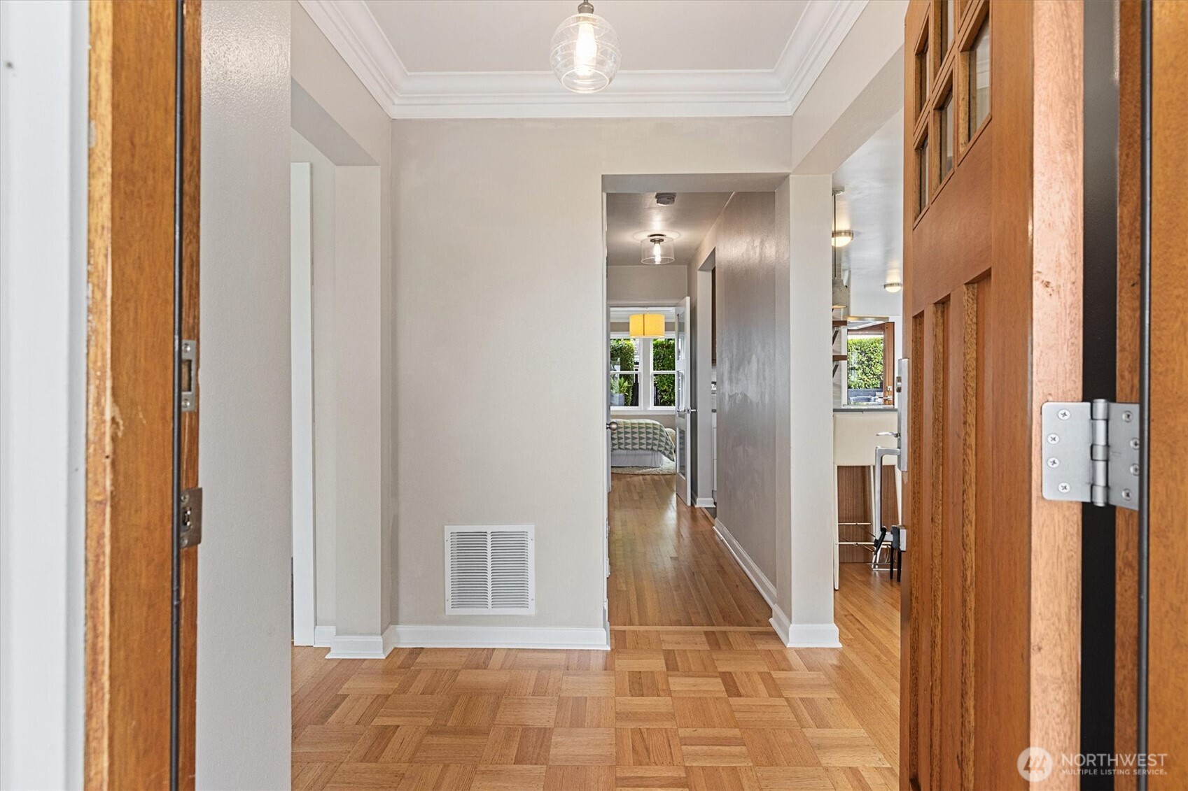 1940 Edgemont Place West Seattle, WA 98199 - Photo 6 of 37 a view of a hallway with wooden floor and staircase