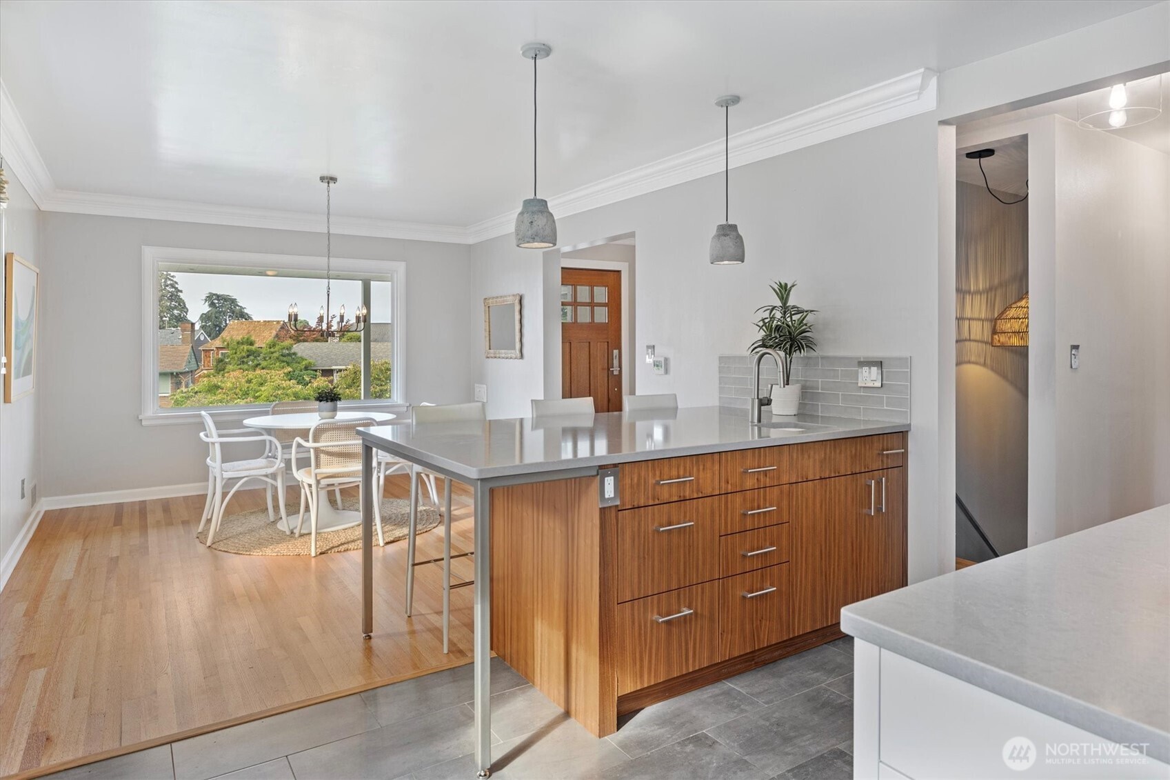 1940 Edgemont Place West Seattle, WA 98199 - Photo 10 of 37 a living room with furniture a chandelier and a dining table
