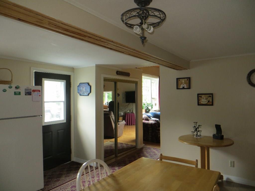 421 Beaulieu Road St. David, ME 04773 - Photo 5 of 35 Front Door - Kitchen opens to living...