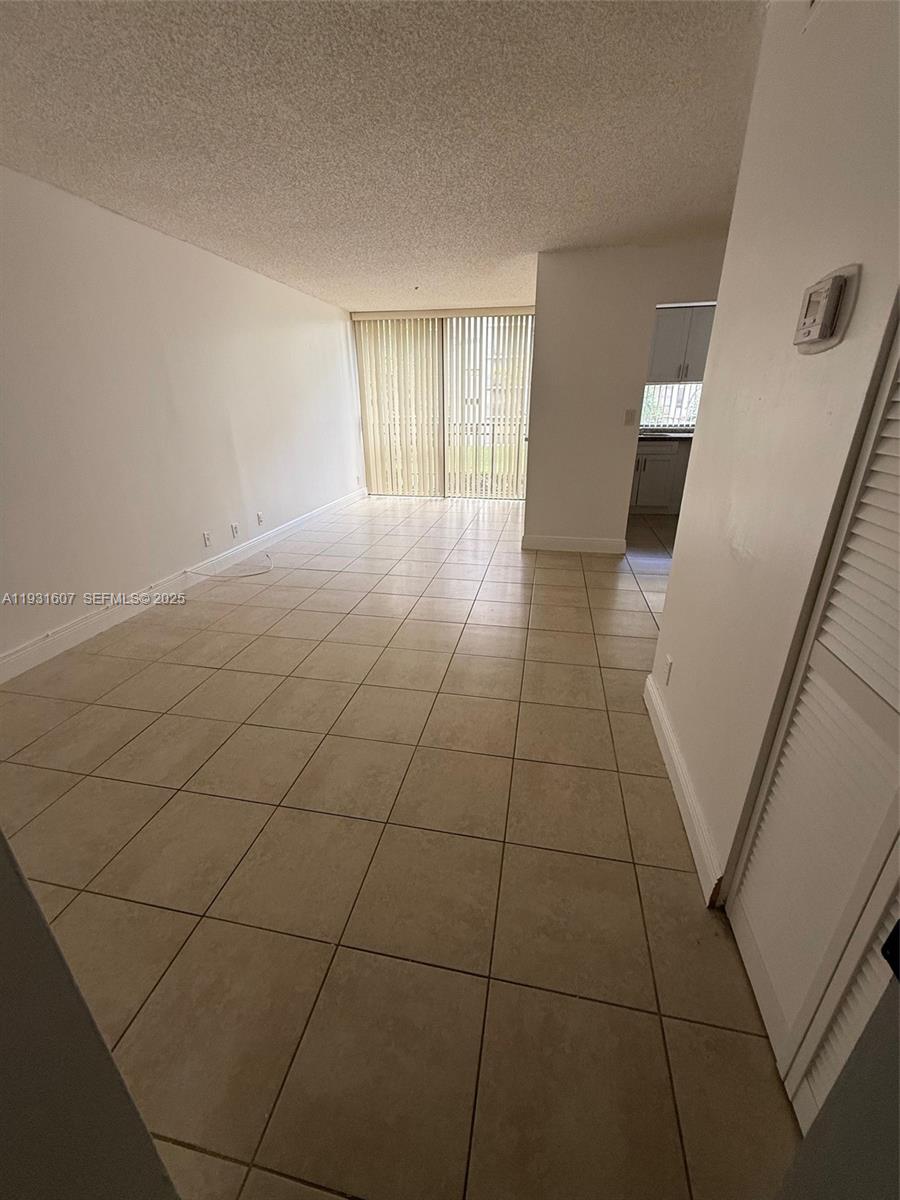 17011 North Bay Road, Unit 204 Sunny Isles Beach, FL 33160 - Photo 29 of 43 a view of an empty room with a window