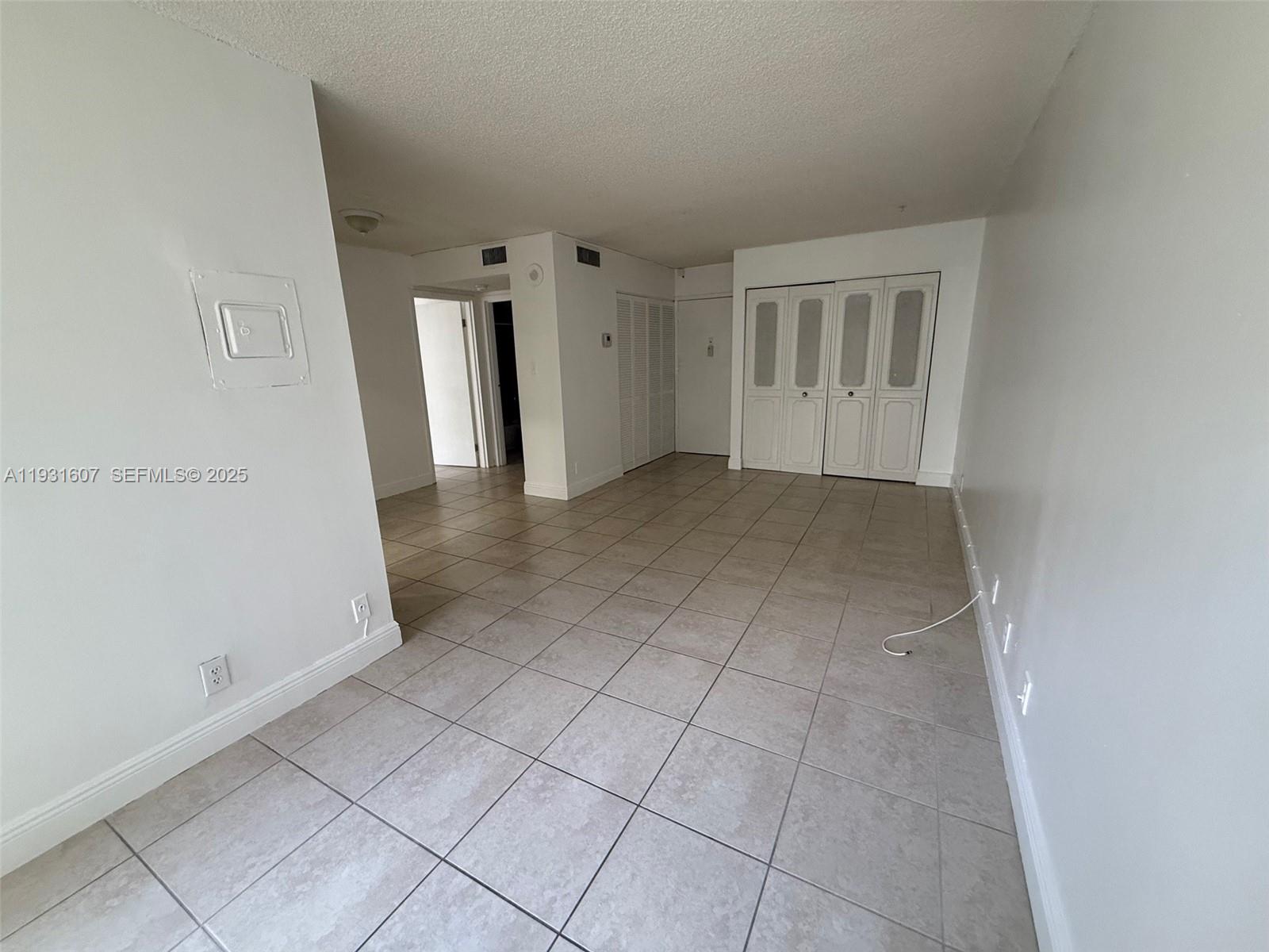 17011 North Bay Road, Unit 204 Sunny Isles Beach, FL 33160 - Photo 32 of 43 an empty room with windows