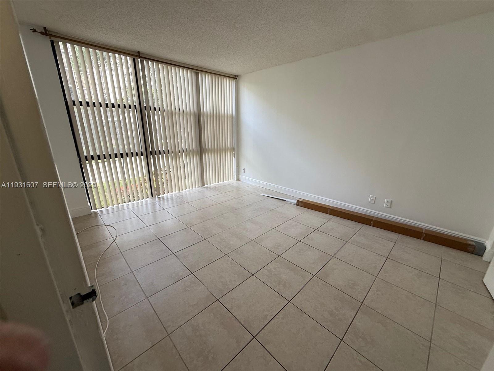 17011 North Bay Road, Unit 204 Sunny Isles Beach, FL 33160 - Photo 41 of 43 wooden floor in a balcony
