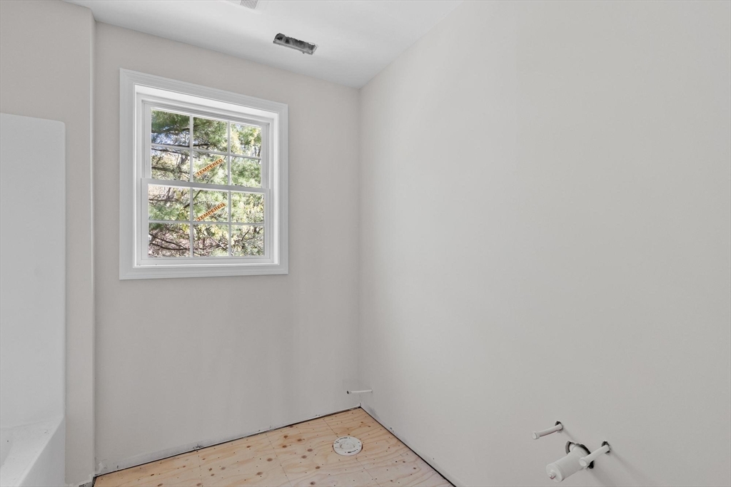 22 Benoit Avenue Pelham, NH 03076 - Photo 19 of 42 an empty room with a window