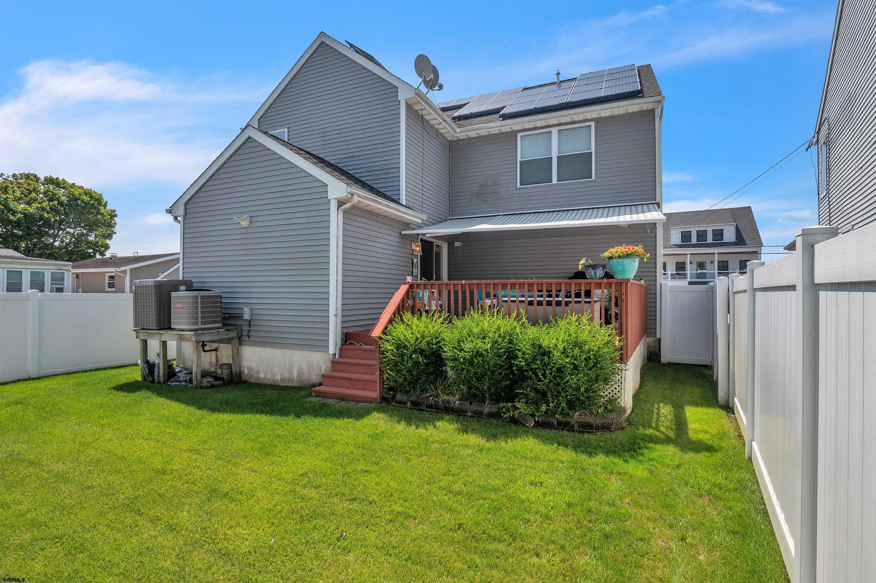 1 MacDonald Place Brigantine, NJ 08203 - Photo 28 of 36 a front view of a house with garden