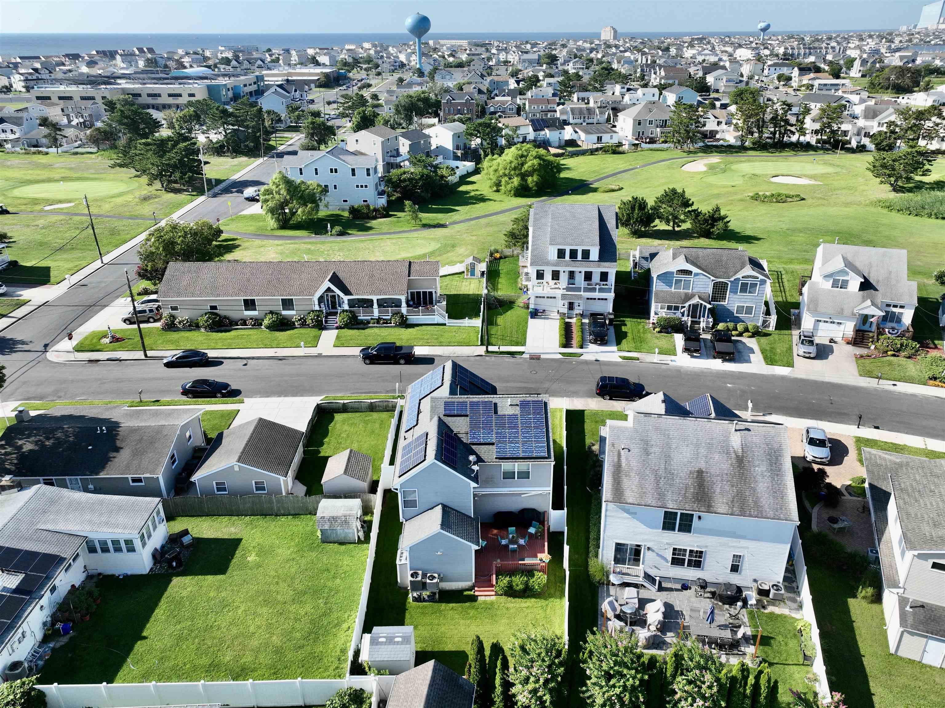 1 MacDonald Place Brigantine, NJ 08203 - Photo 30 of 36 an aerial view of multiple houses with yard