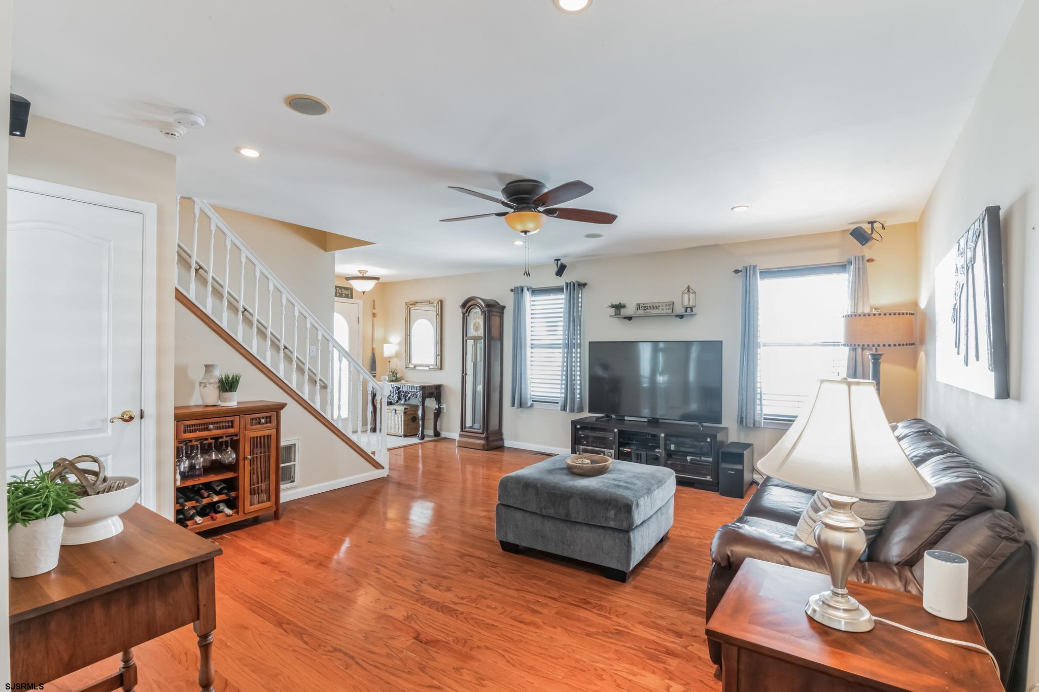 1 MacDonald Place Brigantine, NJ 08203 - Photo 7 of 36 a living room with furniture and a wooden floor