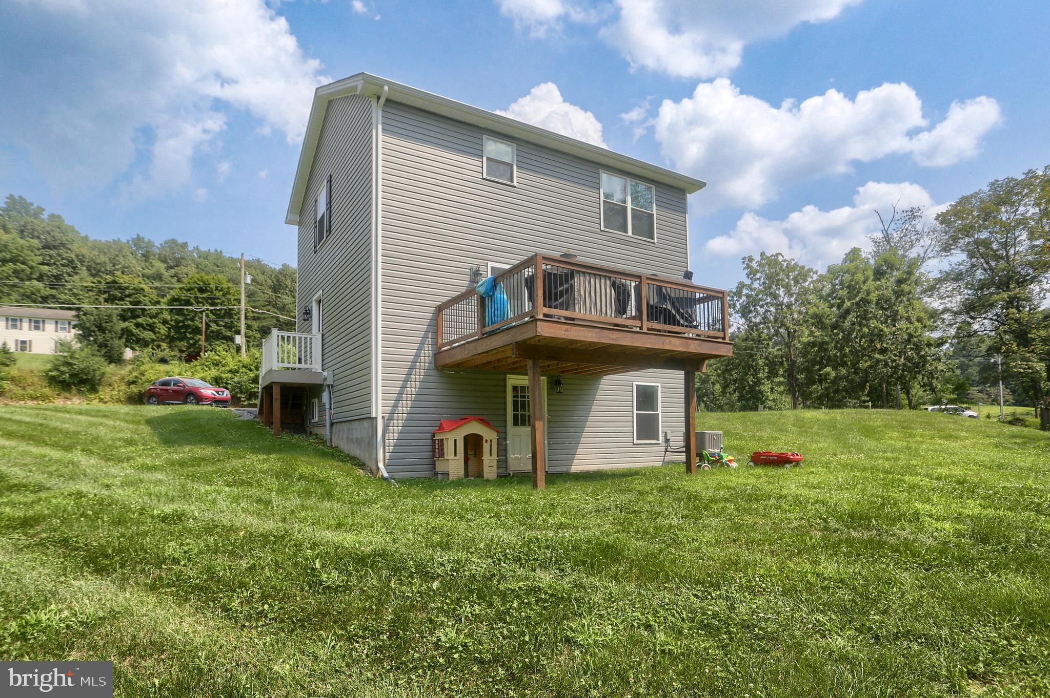 4118 Buckwheat Road Millerstown, PA 17062 - Photo 6 of 26 a view of a house with backyard