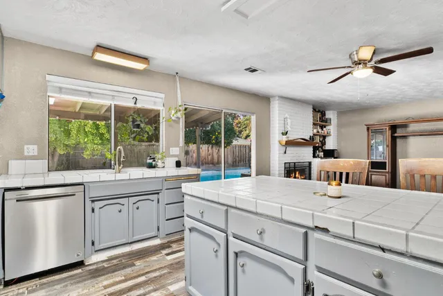 a room with a large bed and a large window