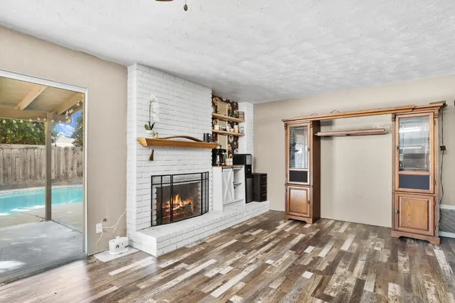 a view of a livingroom with a fireplace